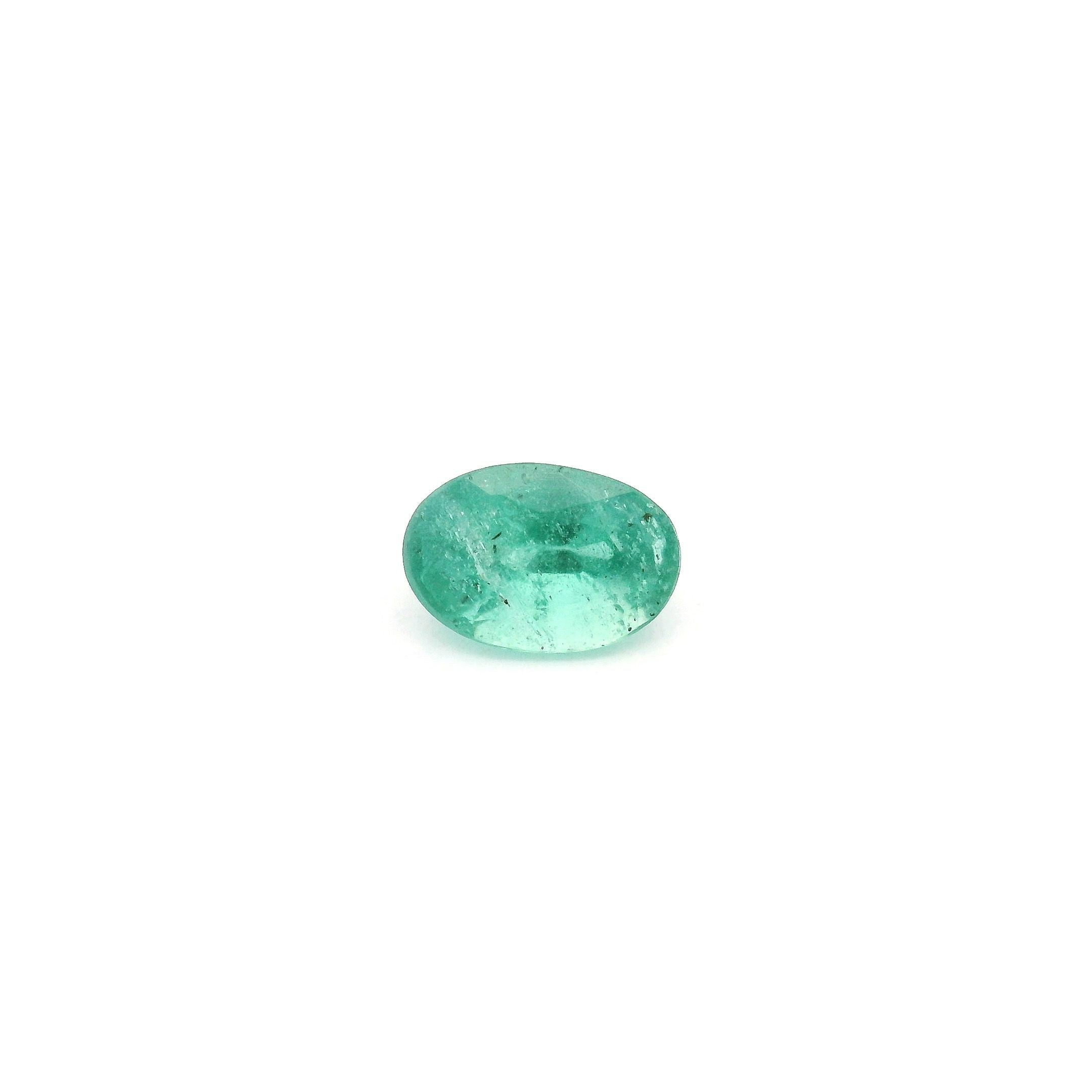 0.63ct · Oval
