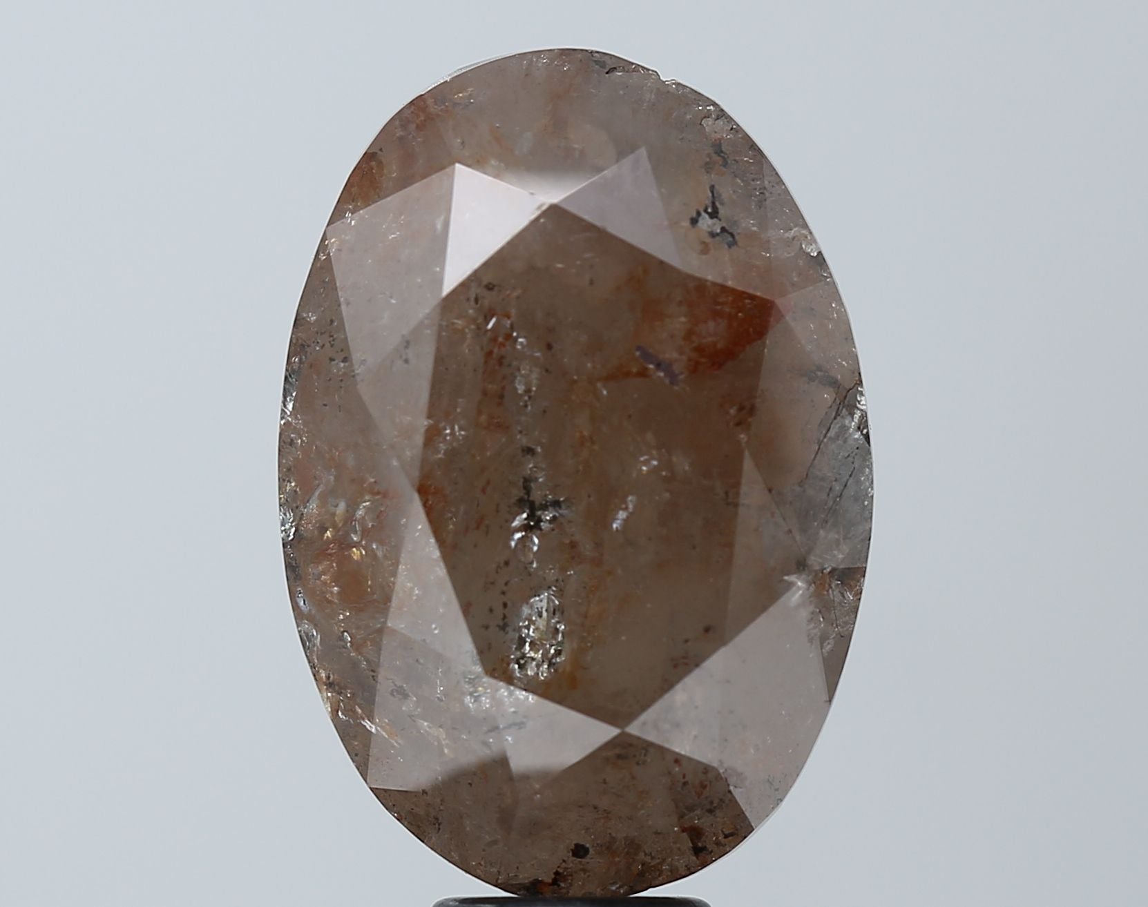 12.52ct · Oval